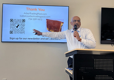 Kumar presenting on his leatherworking company, Arbor Trading Post, at 1 Million Cups Ann Arbor.