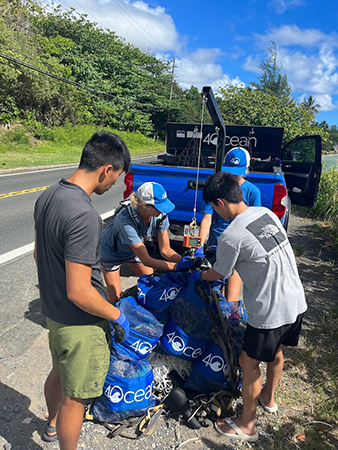 Loading ghost nets for transport by 4Ocean.