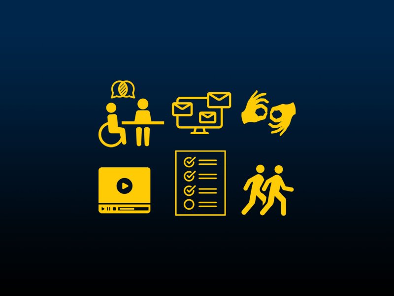 Two people sitting at a table talking, one is a wheelchair user, emails on a computer screen, hands signing, a video screen, a checklist, two people walking together