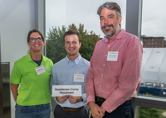 Jason Outcalt (c), with WCP's Haley Buckmaster (l) and Matt Tarver-Wahlquist (r) at Board Fellows Orientation, October 2024