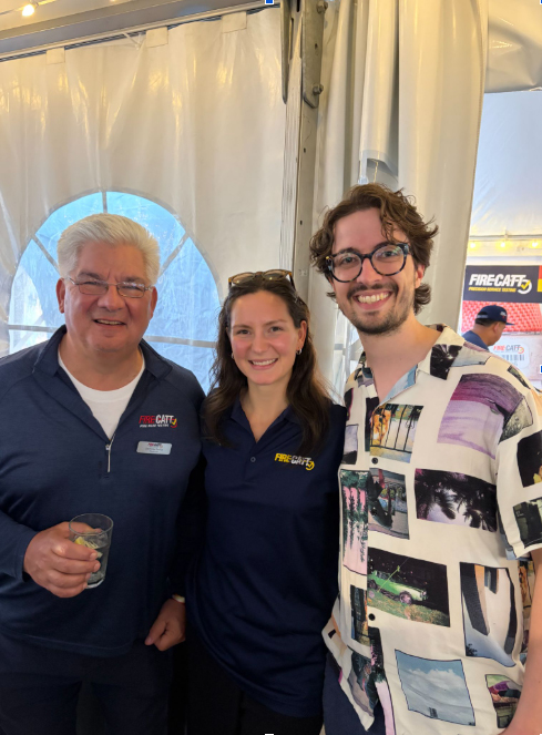 Zachary (Left) and Sophia Savas (Center) at a FireCatt event
