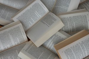 Picture of a collection of open books
